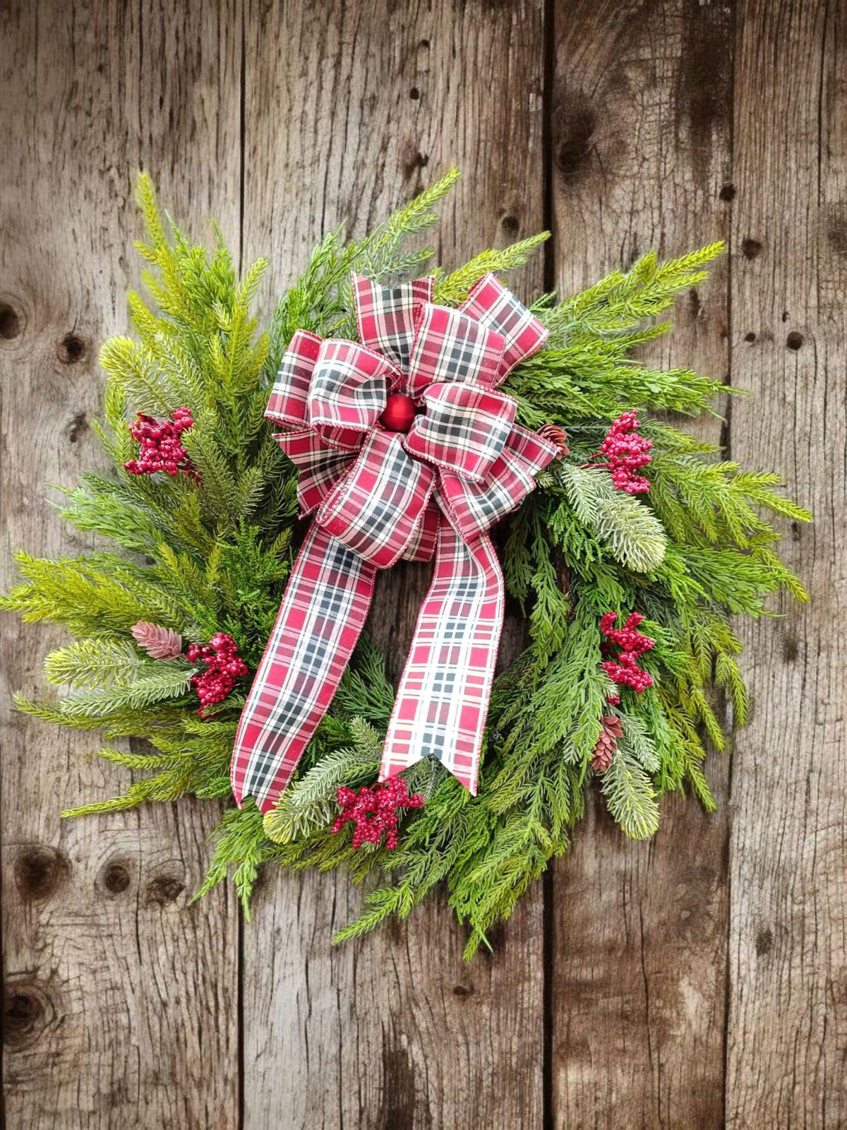 Norfolk Pine and Cedar Realistic Greenery Wreath with Red Berries and Feature Plaid Tartan Bow