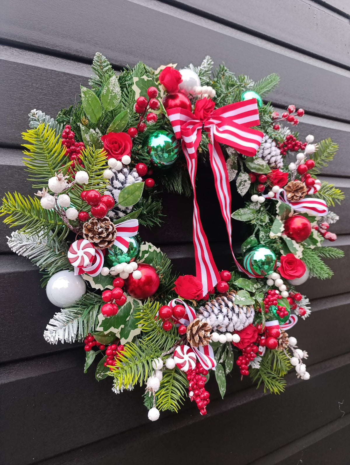 Traditional 60 cm Christmas Wreath with Red Roses, Flocked Pine Cones and Candy Cane Accents