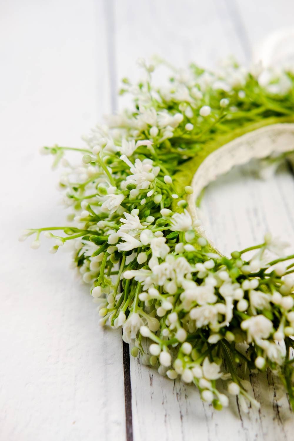 Flower girl's Gypsophila Flower Headband, designed for a comfortable, flexible fit