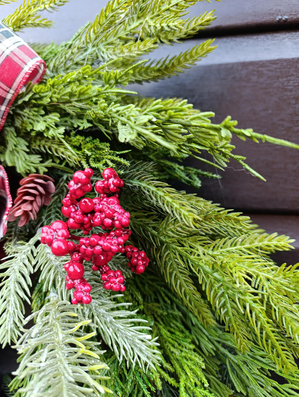 Norfolk Pine and Cedar Realistic Greenery Wreath with Red Berries and Feature Plaid Tartan Bow