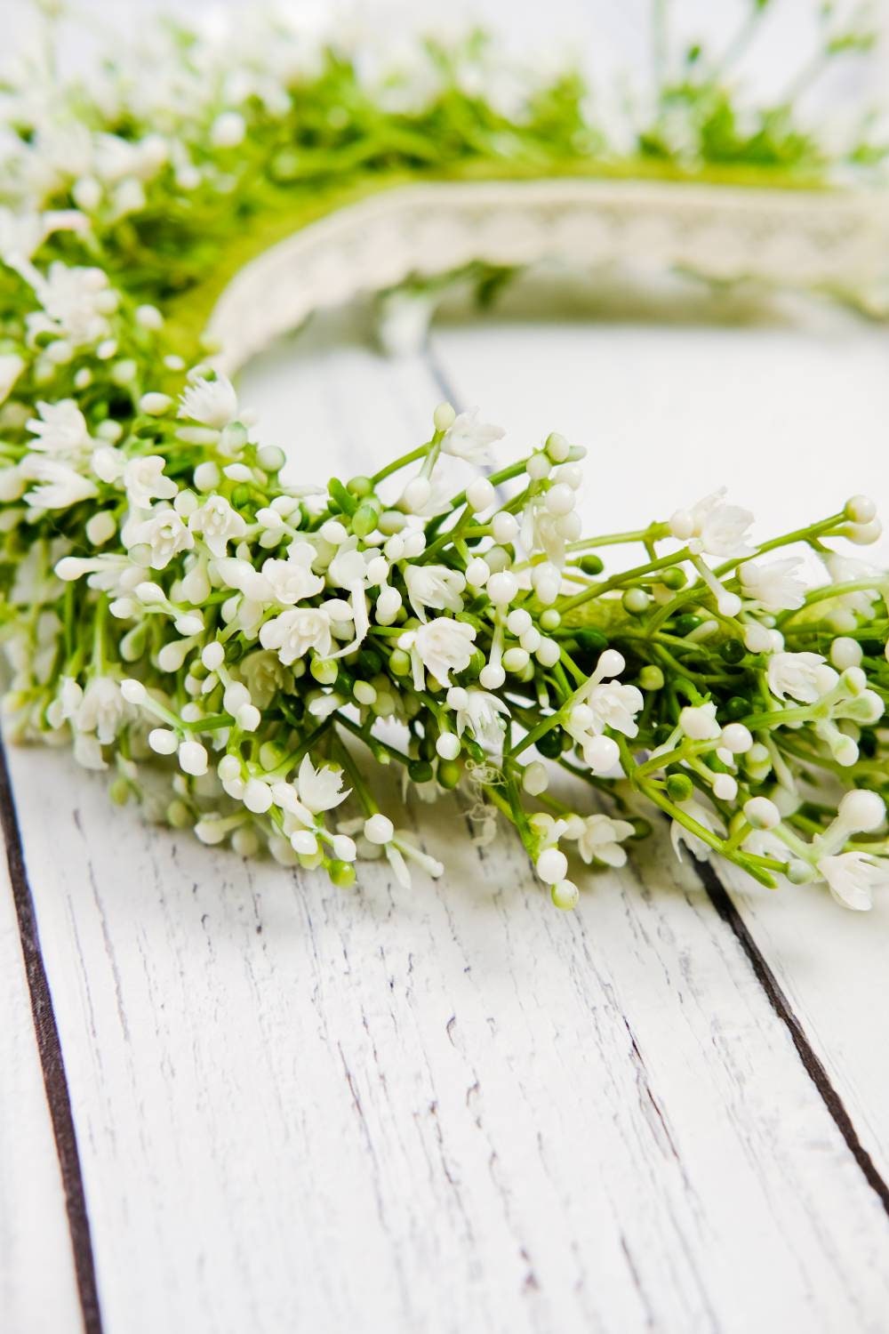 Flower girl's Gypsophila Flower Headband, designed for a comfortable, flexible fit