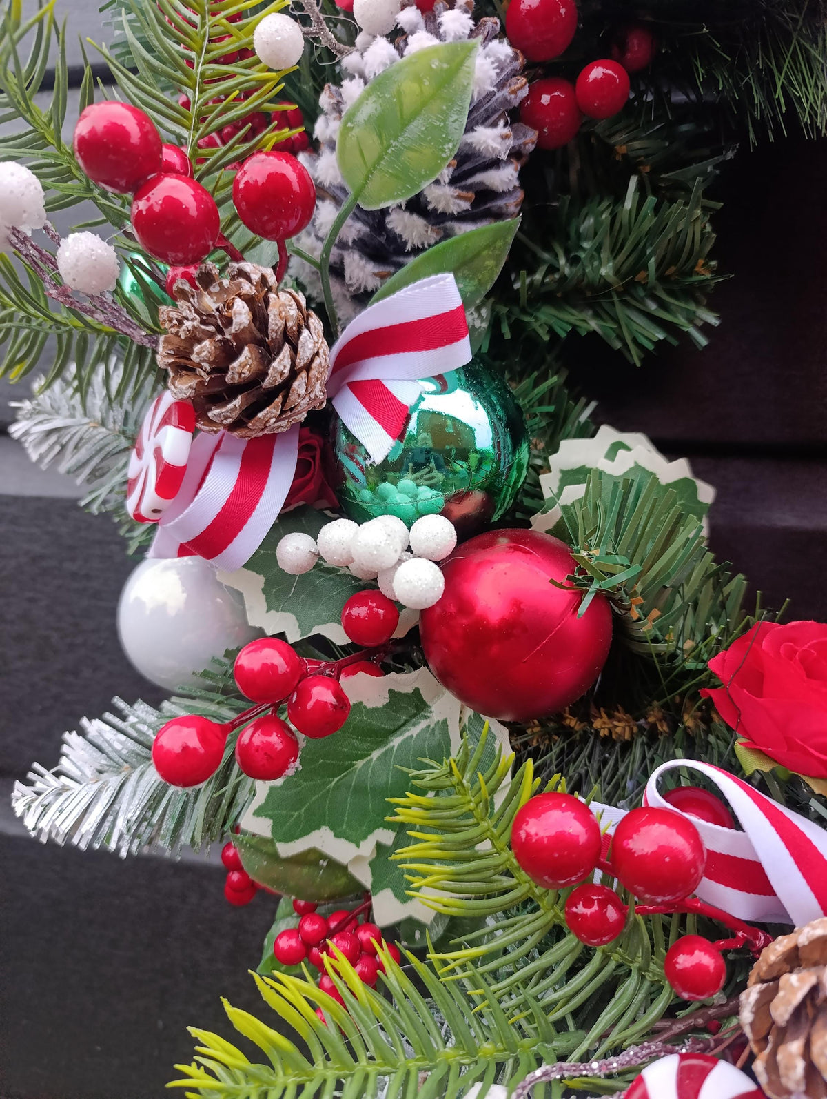 Traditional 60 cm Christmas Wreath with Red Roses, Flocked Pine Cones and Candy Cane Accents