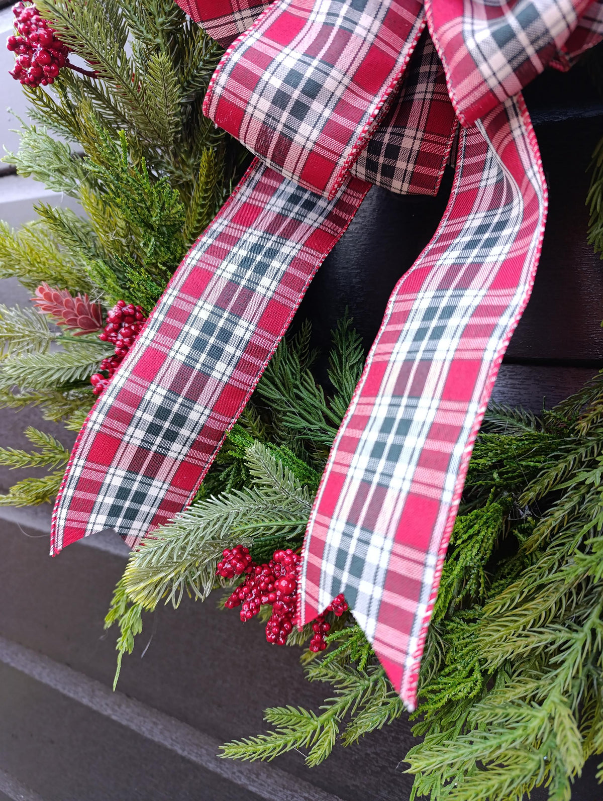 Norfolk Pine and Cedar Realistic Greenery Wreath with Red Berries and Feature Plaid Tartan Bow
