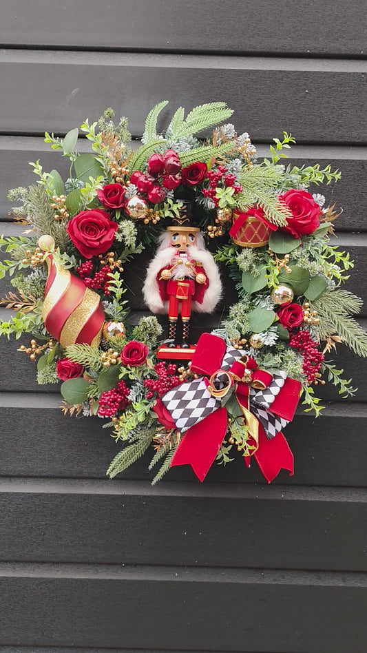 Nutcracker Traditional Christmas Wreath with Red Roses and Festive Decorations